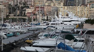 Morning view of the center of the Principality of Monaco and the famous harbor with yachts