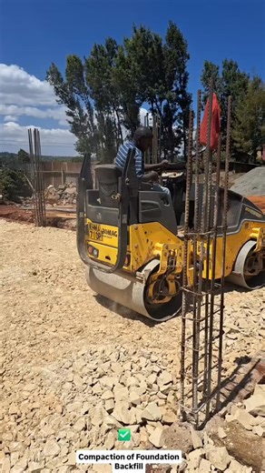 Structural Engineering inspection of compaction of foundation backfill material. We checked for: 1. Quality of the backfill material 2. Delivery load of the compaction machinery/plant 3. Number of passes made by the compaction machinery 4. Manouvring of thr compaction machinery - no damage to foundation walling 5. Moisture content of foundation backfill material Captured in the footage is an active job site in Gikuni 🇰🇪 code named Project Red Ochre We are an Engineering and Project Management 