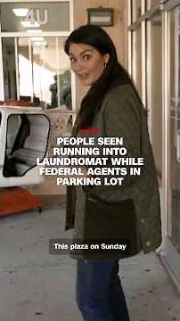 People seen running into laundromat while federal agents in parking lot