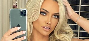 Lindsey Pelas Explores Death Valley In Plunging Swimsuit