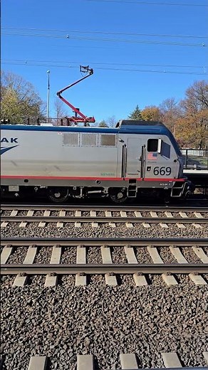 Amtrak ACS-64 No. 669 pushes its train into Metropark station