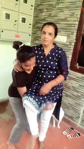 Daughter lifts her mother