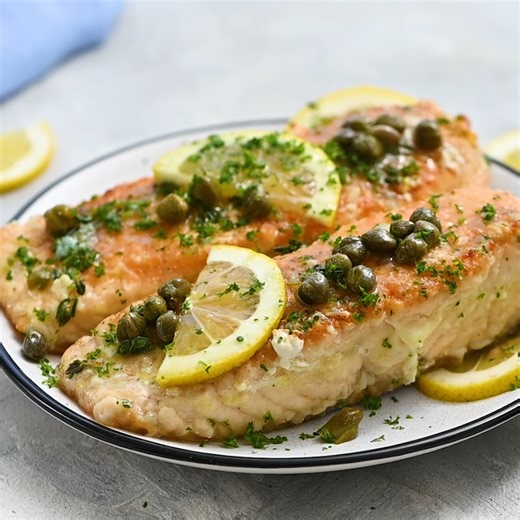Recipe here: https://therecipecritic.com/salmon-piccata/ This easy salmon piccata is a delicious yet elegant meal that is great for a weeknight meal or for when you have guests over. The flakey pan-seared salmon nestled in a bed of a creamy lemon and caper sauce will definitely be a crowd-pleaser! | Tried and True Recipes
