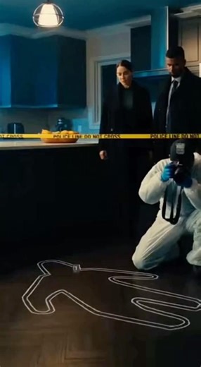 Detectives Investigate a Kitchen Crime Scene