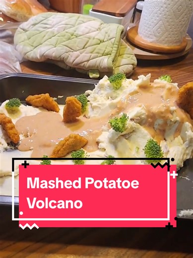 Mashed Potato Volcano for New Years!!! My nephews little voices are just too cute in their excitement. What do you think is the best part? Dino nuggets or mashed potatoes and gravey? My kids I think were more team Dino nuggets vs nephews were team mashed potatoes. #food #fun #funny #dinosaur #kids