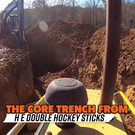 Digging a core trench in a muddy mess.