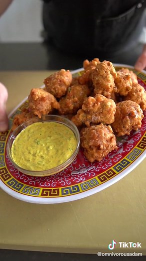 🍟🐚CRONCHY Caribbean Conch Fritters! 🐚🍟 If you were born between 1990 and 1999, chances are conch reminds you of a certain sponge named Bob. Regardless, these fritters take a giant sea snail and make it delicious. I’m sure you’ll dig it. Sorry Gary... Ronch out with your conch out. Full recipe is up on me site! 🤘🏼 Adam #seafood #omnivorousadam #conch #fritters #caribbeantiktok