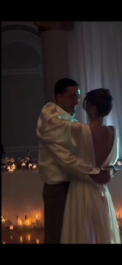 Elegant Couple Slow Dance in Romantic Setting