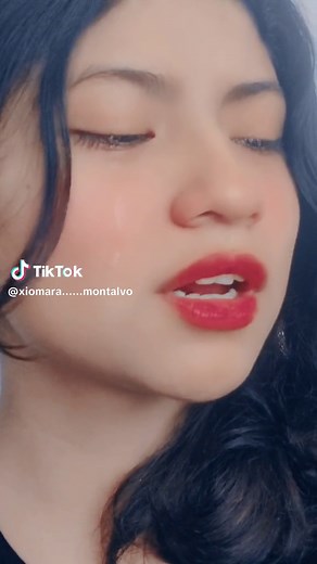 Close-Up Expressions: Dark Hair and Red Lipstick