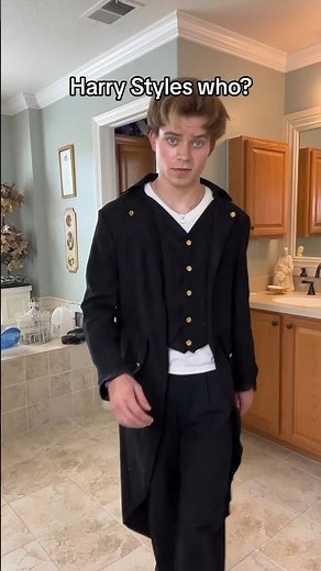 Trying on my parents clothes to see who has the better style