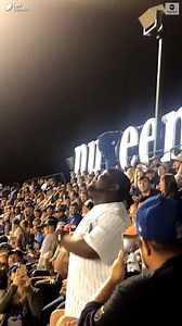 Wrigley Field crowd goes nuts as a Chicago Cubs fan nicknamed Yogi performs an amazing cap trick in the stands during a game. https://abcn.ws/2AtHzMT | ABC News
