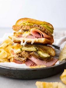 16K views · 79 reactions | Recipe here: https://therecipecritic.com/easy-cuban-sandwich-recipe/ The delicious Easy Cuban Sandwich is layered with two kinds of pork, loads of melted swiss cheese, pickles, and mustard. Toasted in butter and pressed to perfection, this is one ultimate sandwich for pork lovers. | Tried and True Recipes | Facebook