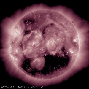 • Broad Coronal Hole • This was the dominant feature this week on the sun. It was easily recognizable as the dark expanse across the lower half of the sun. Coronal holes are magnetically open areas on the sun that allow high-speed solar wind to gush out into space. They always appear darker in extreme ultraviolet. This movie is generated for a wavelength of 211 Ångstroms (21.1 nanometers) which highlights a spectral line emitted by iron atoms that have lost 13 electrons (also known as iron-14 or