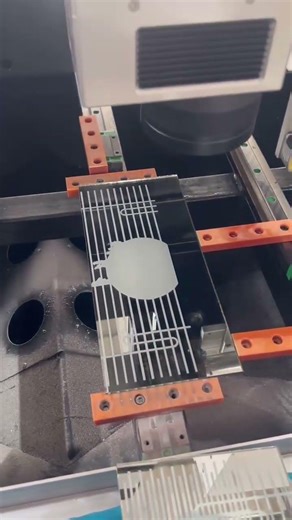 How does a glass laser sand blasting machine improve production time?
