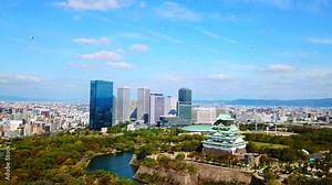 Osaka Castle - High aerial view in daytime by drone. The best ever landmark , Osaka - Japan [4k Resolution]