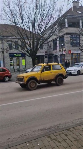 Lada 4x4 SUV Passing by in an Urban Environment #automobile #car #classic