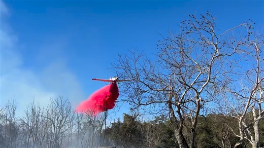 Video courtesy of Texas A&M Forest Service. A single-engine air tanker drops fire retardant as crews battle a brush fire near Mundine Road and Highway 188 in Rockport. | KIII 3 News