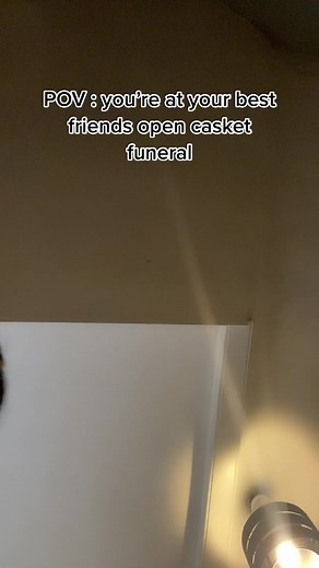 Grieving at a Loved One's Funeral - A Painful Moment