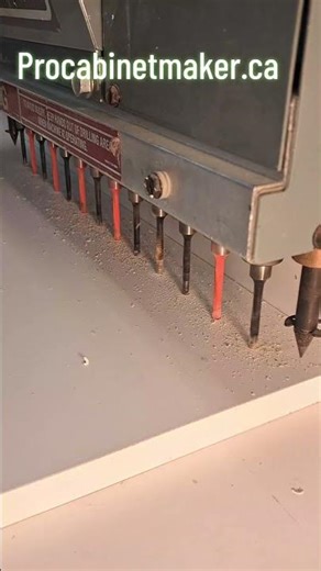 Drilling shelf pin holes on a cabinet panel 🔧 Follow for real workshop 🔨 #cabinetmaking