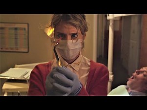 Mackenzie Davis in purple nitrile gloves