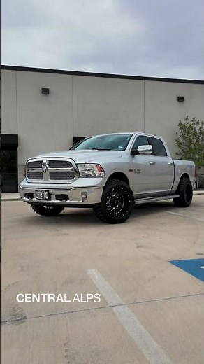 2017 Ram 1500 SLT: 2" Rough Country Level, 20x12 Impact Wheels, & 33" RBP Tires