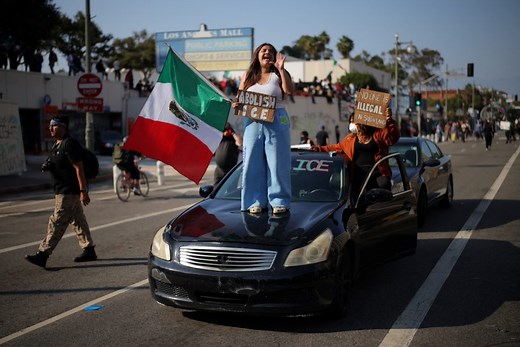 Troops deployed in LA as immigration raids stir fear and protests