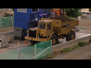 CAT D25D on the way to the landfill