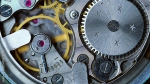 macro clockwork mechanism of an old Watch disassembled with cogwheels running slowly on silver steel hands gear movement working close up detail antique Pocket watch, Clock, Analog, Vintage,Mechanical Stock Video