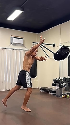 Explosive Core Rotation - age 56, October 9, 2025 The sandbag weighs 50 pounds and constitutes about 1/4 of my body weight. The goal is to pick the bag up and throw it in a way that it travels straight through the air like a bullet and it doesn’t tumble. Picking something up, spinning with it, and projecting it while maintaining balance and trajectory has a large carryover in martial and athletic applications. Once I pick the bag up from the floor, I only have one swing to get the bag moving int