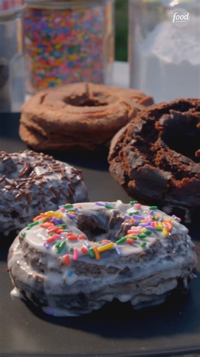 58K views · 326 reactions | These rich and chocolatey donuts are truly a labor of love as Michael D. Symon and Liz help their granddaughter cover these treats in rainbow sprinkles!  Catch an ALL-NEW #SymonDinners tomorrow @ 12|11c! Get the recipe: https://foodtv.com/3VCtVkZ | Food Network | Facebook