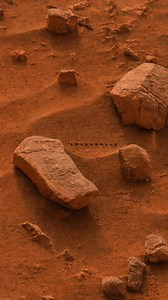 That “little drilling” you’re seeing on Mars is actually NASA’s rover at work, not natural damage. Mars rovers like Curiosity and Perseverance use a small drill to: • Scratch or drill into rocks • Collect powdered samples from below the surface • Study the rock’s chemical makeup Why drill at all? Because Mars’ surface is exposed to radiation, dust, and wind. Drilling lets scientists study fresh, untouched material that could hold clues about: • Mars’ ancient water • Past habitability • Possible 