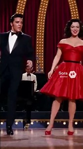 Elvis and Jane Russell tap dancing on stage