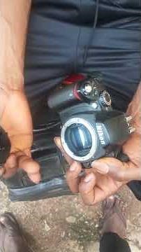 How to remove Nikon D60 camera's lens.