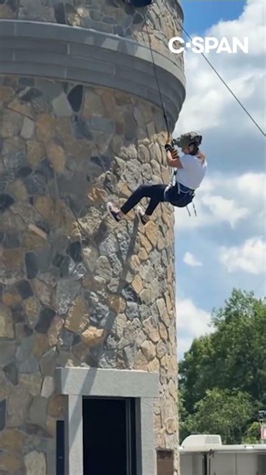 New Hampshire governor rappels down tower
