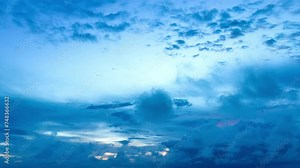 Aerial hyper lapse view amazing cloud moving in blue sky at blue sunrise above the ocean..scenery stunning sky colorful cloud over the islands in Rawai sea Phuket Thailand..Sky texture.