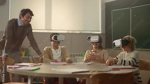 Teacher having interactive lesson with students in 3d vr glasses in classroom