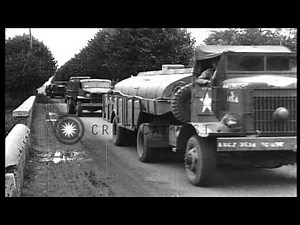 U.S. Army "Red Ball" Convoy passes through village of Courville sur eure, France...HD Stock Footage