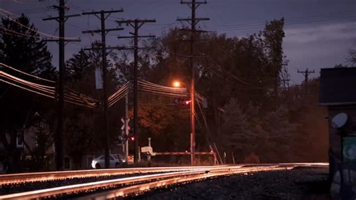 Under a light drizzle, CSX L310 gets rolling out of Plymouth, MI just after dark on the Saginaw Sub. #railroad #railway #train #rail #reels #video #night #evening #fall #rain #mood #moody #october | Craig Hensley Photography