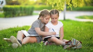 Cutie Girls Doing Homework Together Outdoor Stock Footage Video (100% Royalty-free) 1011448484 | Shutterstock