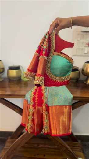 Advithi designer studio on Instagram: "A finely crafted pleated blouse in rich red, beautifully complemented by soft light blue tones✨ The gentle pleats add depth and grace, while delicate cutwork embroidery highlights the craftsmanship with subtle elegance❤️ Designed to enhance the overall look with quiet sophistication, this blouse is perfect for those who appreciate refined details and timeless style✨✨"