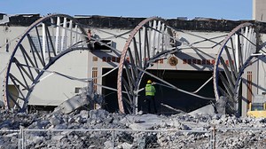 Armory Demolition: Roof structure is pulled down
