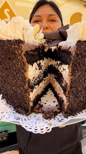 Wait til you get your hands (and mouth) on our January's Cake of the Month, the Tuxedo Cake! Layers of chocolate cake, chocolate and white chocolate mousse, and chocolate ganache, with whipped cream frosting on top will start your year off in the most delicious way! | Sherman's Delicatessen & Bakery