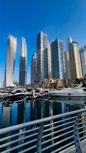 Visit Dubai on Instagram: "The breeze is real, the vibes are easy, and the sea is right there! This is what walks in Dubai Marina look like 💙 📸 @ameen.amp #VisitDubai"