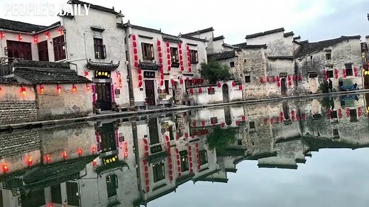 Hongcun, a historical village in E China's Anhui, is a @UNESCO World Heritage Site. The street by the lake is a pleasant place for wandering, sightseeing, or just enjoying a peaceful afternoon. | People's Daily, China
