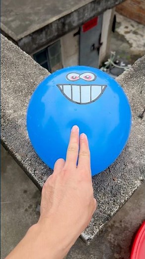 Experiment: Will a water balloon explode when it rolls down from a tall building? 💥🎈 #balloon