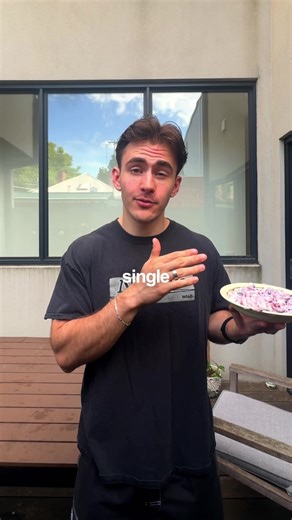 The one weird trick that helped fix my binge eating: the no phone's at the table rule. Pretty simple: eat your meals without distractions. No YouTube. No TVs This allows your brain and body to start syncing up again, so your body can start telling your brain that it's full and nourished. Want more weird tips that helped me go from binging weekly to never again? DM me the word