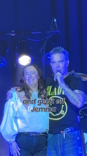 A Robbie Williams superfan from Wolverhampton who went viral joined the star on stage when he performed in Wolverhampton. When she was 14, Jemma Williamson travelled from her then home in Wirral to Chester for a Take That signing event. But her dreams of meeting Robbie were thwarted when she was unable to get in. Despite the setback, Jemma stayed at the venue and was filmed by crews. She took her chance to send a message to Robbie, asking the singer to call her. The footage, from more than 30 ye