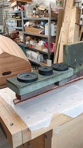 This is going to be the Skeg. Two Mahogany boards, epoxy glued and under pressure. #boatbuilding