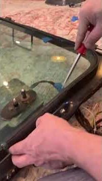 Bobcat S250 Skid-steer glass install video 2 of 2 - inside door frame procedure