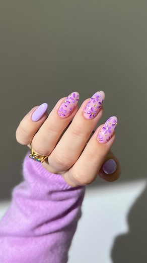 Aistė Haas on Instagram: "💜🌸 purple marble flowers, delicate as a lilac petal, sprinkled with golden flakes ✨ Using: @gelcare.official Rose BB Cream | Taro Tea | Grape Juice For 15% off use code: AISTE _____ (*aff) #purplenails #glitternails #marblenails #nailinspo #flowernails #sparklynails #springnails #nails #ombrenails cute nails , almond nails, nail art tutorial, pastel nails lavender"